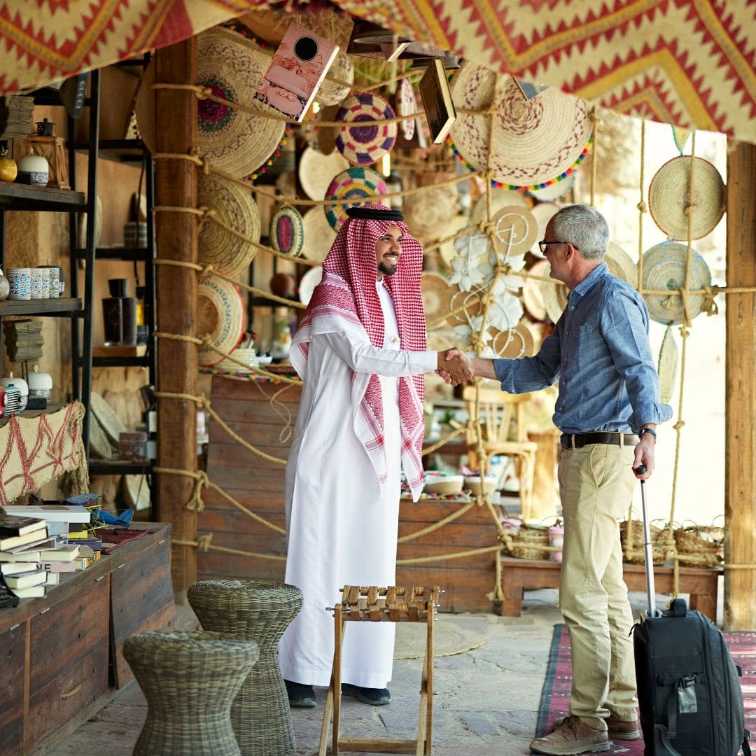 Team members collaborating in Saudi office